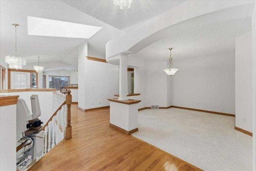 69 Scimitar Point Nw, Calgary, AB - Indoor Photo Showing Other Room