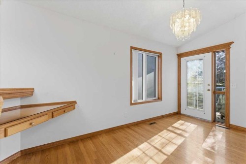 69 Scimitar Point Nw, Calgary, AB - Indoor Photo Showing Other Room