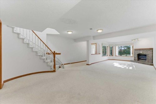 69 Scimitar Point Nw, Calgary, AB - Indoor Photo Showing Other Room