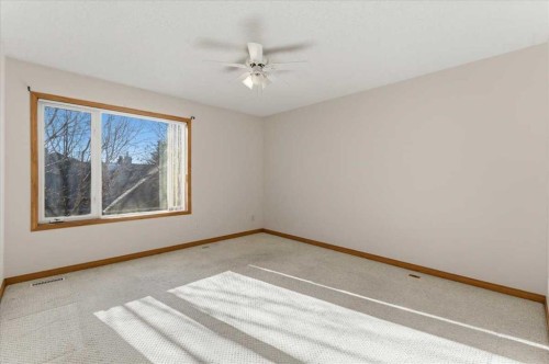 69 Scimitar Point Nw, Calgary, AB - Indoor Photo Showing Other Room