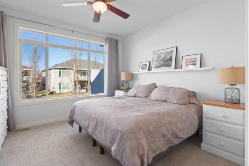 1909 Riverside Drive Nw, High River, AB - Indoor Photo Showing Bedroom