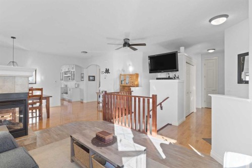 1909 Riverside Drive Nw, High River, AB - Indoor Photo Showing Living Room With Fireplace