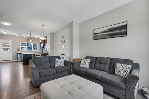 140 Sundown Road, Cochrane, AB - Indoor Photo Showing Living Room