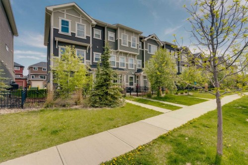 140 Sundown Road, Cochrane, AB - Outdoor With Facade