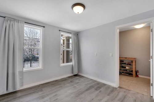 140 Sundown Road, Cochrane, AB - Indoor Photo Showing Other Room