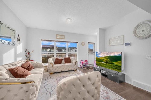 533 Savanna Boulevard Ne, Calgary, AB - Indoor Photo Showing Living Room