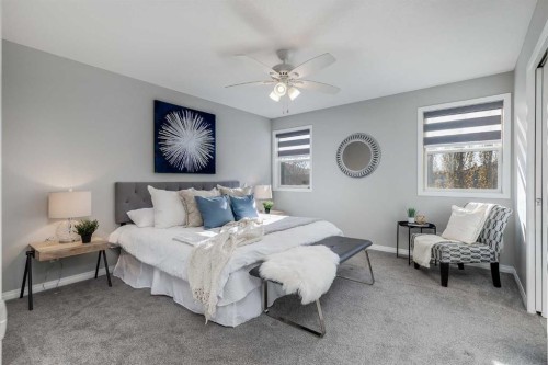 208 Fairways Bay Nw, Airdrie, AB - Indoor Photo Showing Bedroom