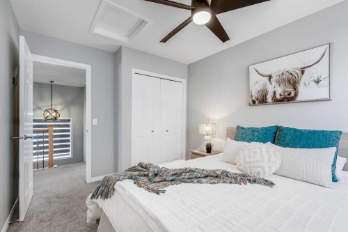 208 Fairways Bay Nw, Airdrie, AB - Indoor Photo Showing Bedroom