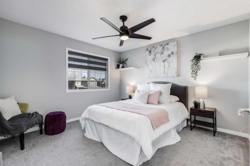 208 Fairways Bay Nw, Airdrie, AB - Indoor Photo Showing Bedroom