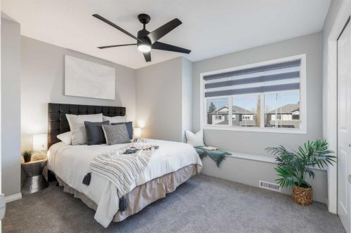 208 Fairways Bay Nw, Airdrie, AB - Indoor Photo Showing Bedroom