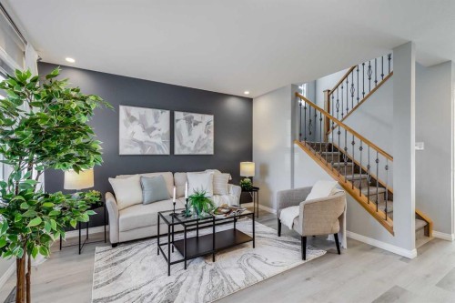 208 Fairways Bay Nw, Airdrie, AB - Indoor Photo Showing Living Room