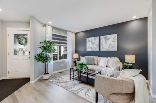 208 Fairways Bay Nw, Airdrie, AB - Indoor Photo Showing Living Room