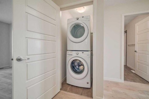 607 Nolanlake Villas Nw, Calgary, AB - Indoor Photo Showing Laundry Room