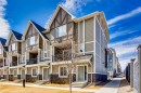 607 Nolanlake Villas Nw, Calgary, AB  - Outdoor With Balcony With Facade 