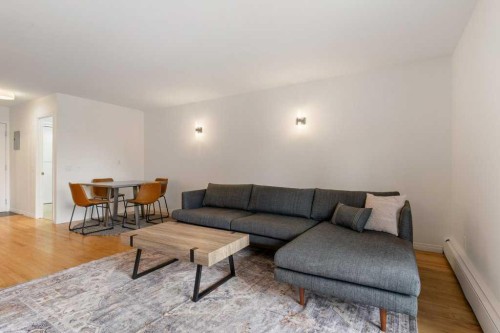 10-210 25 Avenue Sw, Calgary, AB - Indoor Photo Showing Living Room