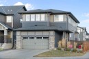 92 Thoroughbred Boulevard, Cochrane, AB  - Outdoor With Facade 