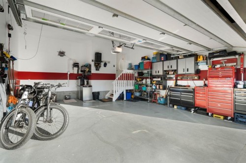 92 Thoroughbred Boulevard, Cochrane, AB - Indoor Photo Showing Garage