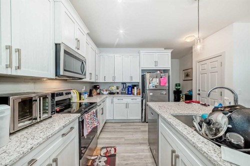 116 Ambleton Street Nw, Calgary, AB - Indoor Photo Showing Kitchen