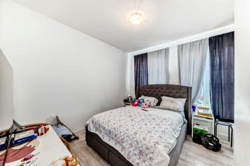 116 Ambleton Street Nw, Calgary, AB - Indoor Photo Showing Bedroom