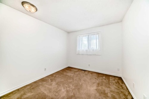 66 Templeby Way Ne, Calgary, AB - Indoor Photo Showing Other Room