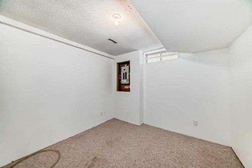 66 Templeby Way Ne, Calgary, AB - Indoor Photo Showing Other Room