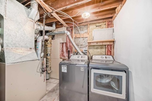 66 Templeby Way Ne, Calgary, AB - Indoor Photo Showing Laundry Room