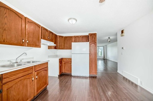 66 Templeby Way Ne, Calgary, AB - Indoor Photo Showing Kitchen With Double Sink