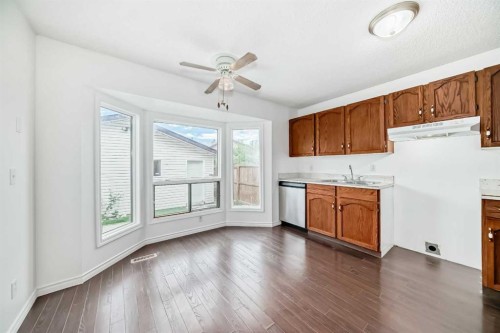 66 Templeby Way Ne, Calgary, AB - Indoor Photo Showing Kitchen With Fireplace