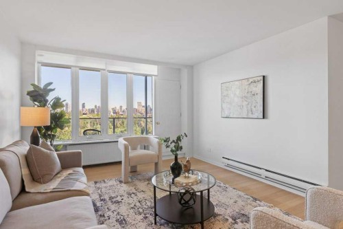 708-3204 Rideau Place Sw, Calgary, AB - Indoor Photo Showing Living Room