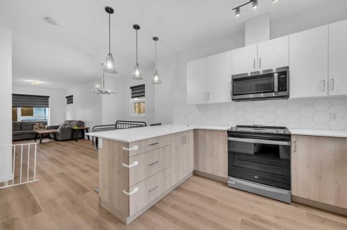 348-301 Redstone Boulevard Ne, Calgary, AB - Indoor Photo Showing Kitchen With Upgraded Kitchen