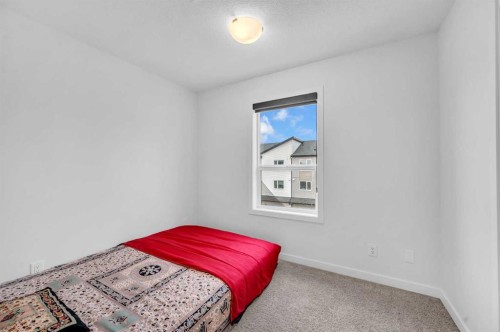 348-301 Redstone Boulevard Ne, Calgary, AB - Indoor Photo Showing Bedroom