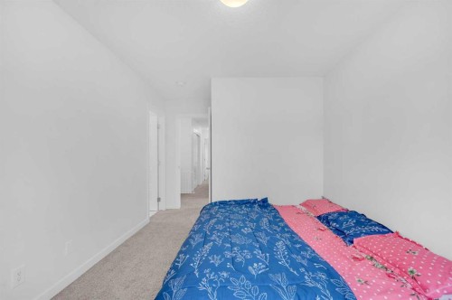 348-301 Redstone Boulevard Ne, Calgary, AB - Indoor Photo Showing Bedroom