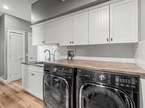 18 Sunset Ridge Drive, Rural Foothills County, AB - Indoor Photo Showing Laundry Room