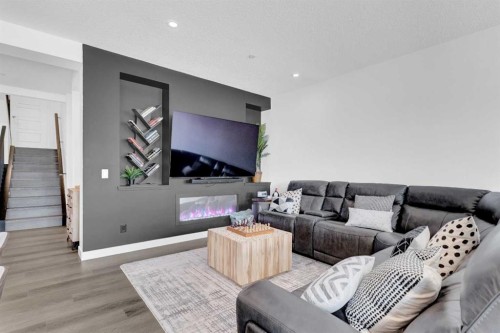 264 Lucas Way Nw, Calgary, AB - Indoor Photo Showing Living Room