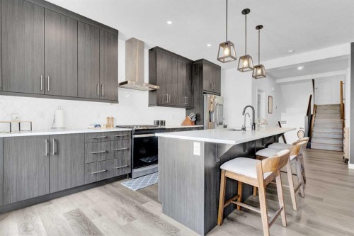264 Lucas Way Nw, Calgary, AB - Indoor Photo Showing Kitchen With Upgraded Kitchen