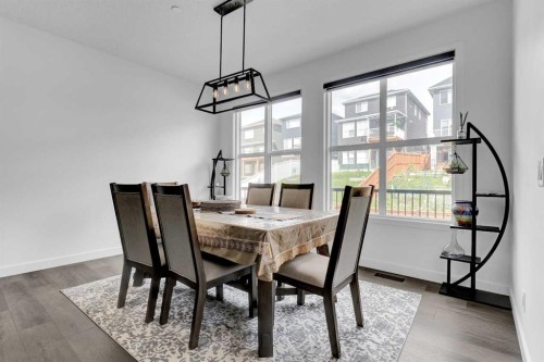 264 Lucas Way Nw, Calgary, AB - Indoor Photo Showing Dining Room