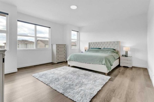 264 Lucas Way Nw, Calgary, AB - Indoor Photo Showing Bedroom