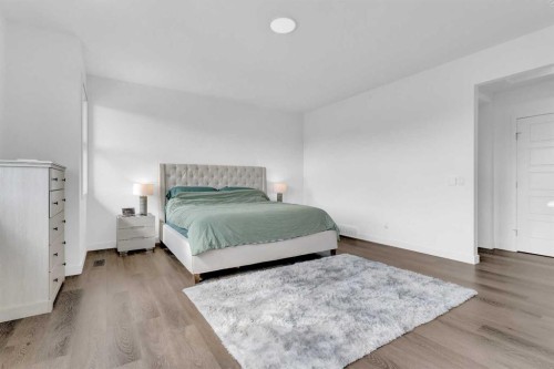 264 Lucas Way Nw, Calgary, AB - Indoor Photo Showing Bedroom
