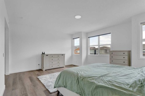264 Lucas Way Nw, Calgary, AB - Indoor Photo Showing Bedroom
