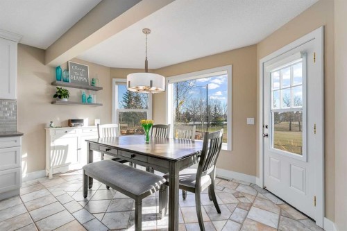 1719 Woodside Boulevard Nw, Airdrie, AB - Indoor Photo Showing Dining Room