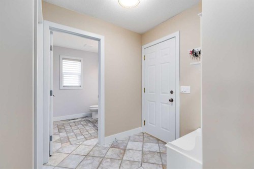 1719 Woodside Boulevard Nw, Airdrie, AB - Indoor Photo Showing Other Room