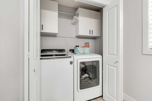 1719 Woodside Boulevard Nw, Airdrie, AB - Indoor Photo Showing Laundry Room