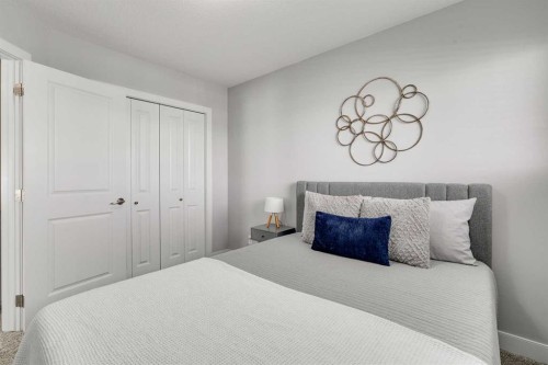 1719 Woodside Boulevard Nw, Airdrie, AB - Indoor Photo Showing Bedroom