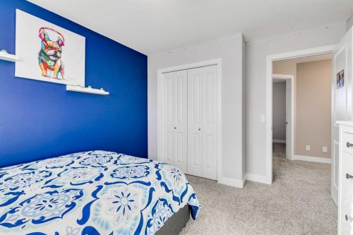 1719 Woodside Boulevard Nw, Airdrie, AB - Indoor Photo Showing Bedroom