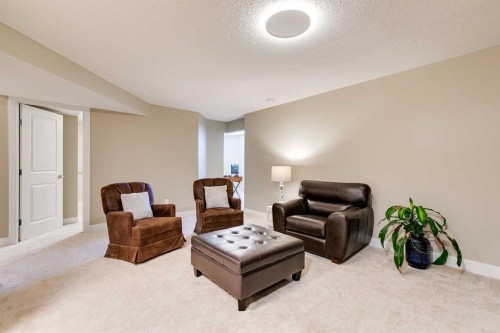 1719 Woodside Boulevard Nw, Airdrie, AB - Indoor Photo Showing Living Room