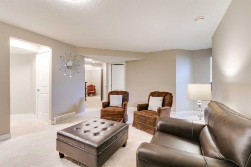 1719 Woodside Boulevard Nw, Airdrie, AB - Indoor Photo Showing Living Room