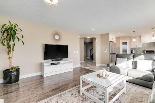 1719 Woodside Boulevard Nw, Airdrie, AB - Indoor Photo Showing Living Room