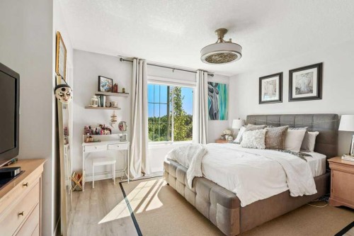 2202-250 Fireside View, Cochrane, AB - Indoor Photo Showing Bedroom