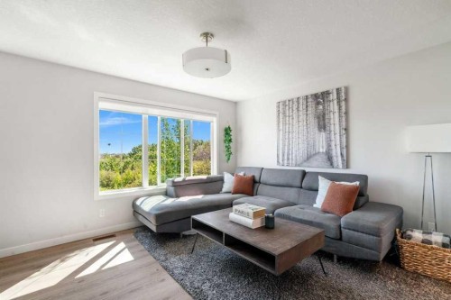 2202-250 Fireside View, Cochrane, AB - Indoor Photo Showing Living Room