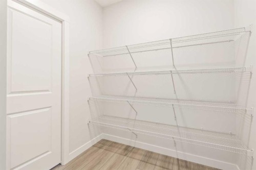 152 Creekstone Circle Sw, Calgary, AB - Indoor With Storage